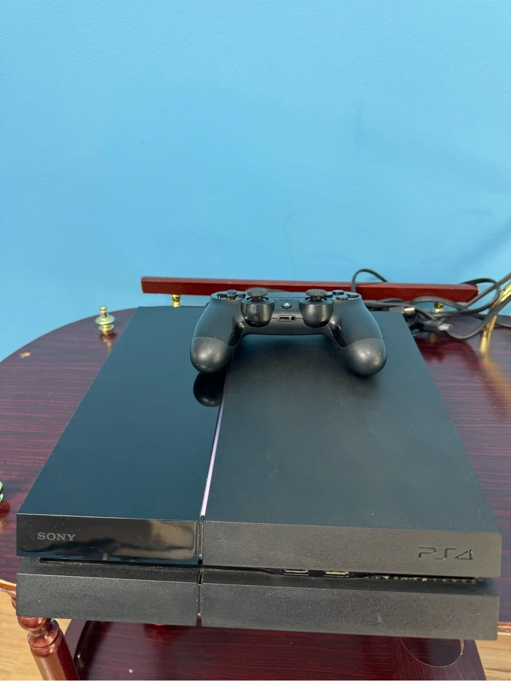Sony PlayStation 4 Console with Black DualShock Controller